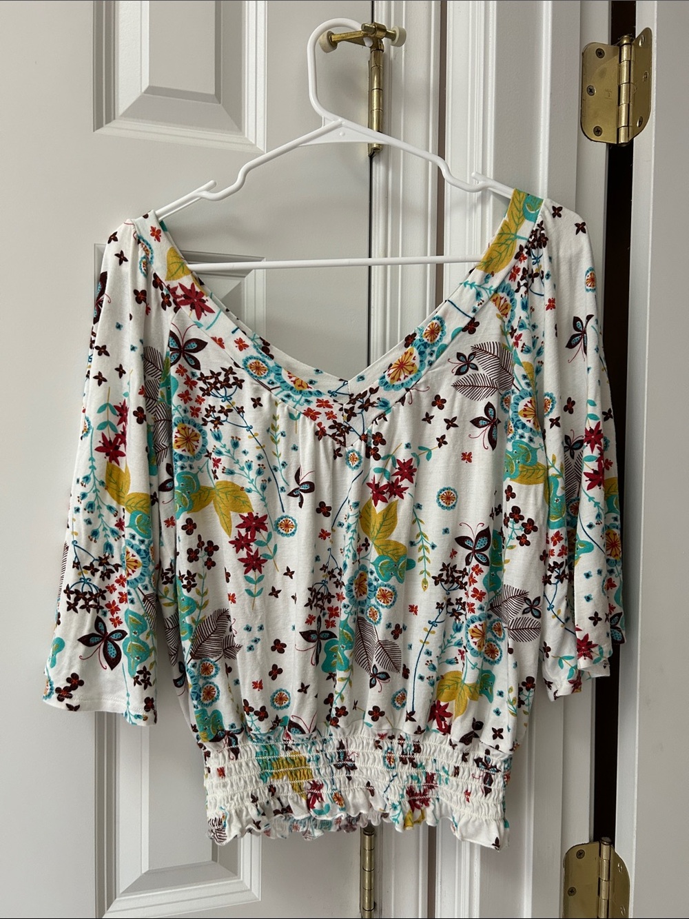 American Rag White Floral V-Neck Smocked Hem Top with Teal & Mustard Accents
